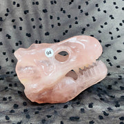 Rose Quartz Crystal Hand Carved Dinosaur Skull